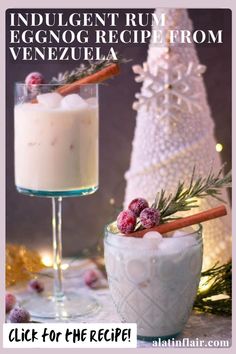 an eggnog recipe from venezuela in a glass next to a small christmas tree