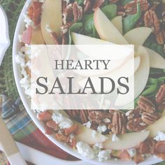 a salad with apples, pecans and goat cheese