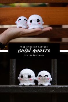 two crocheted ghost dolls sitting on top of each other