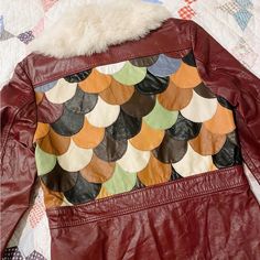 70s Vintage Patchwork Leather Jacket With Rabbit Fur Collar. 3 Button Closure, Attached Belt. By K&H Genuine Leather Aaa Quality Columbus Ohio. In Excellent Vintage Condition. I Bought This Over A Year Ago And Love It But Don’t Find Myself Reaching For It Often Enough, Would Love For This To Go To Someone Who Will Give It More Wear! Measurements: Shoulders: 16” Pit To Pit: 18” Shoulder To Bottom: 22.5” #Vintage #Leather #70s #Patchwork Red Vintage Leather Jacket With Long Sleeves, Retro Fall Outerwear For Vintage Fashion, Vintage Multicolor Outerwear With Buttons, Retro Brown Patchwork Outerwear, Retro Single Breasted Leather Jacket With Long Sleeves, Retro Single-breasted Leather Jacket With Long Sleeves, Retro Single-breasted Leather Jacket For Fall, Retro Leather Jacket With Snap Buttons For Winter, Retro Brown Outerwear For Vintage Fashion