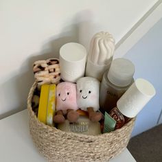 a basket filled with different items on top of a table