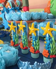 under the sea themed birthday party with starfish and corals in plastic vases