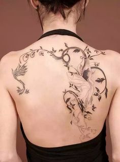 a woman with a tattoo on her back