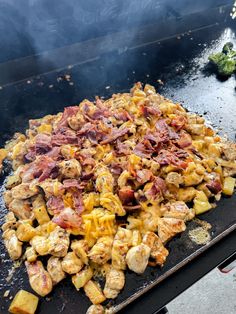 the food is being cooked on the grill