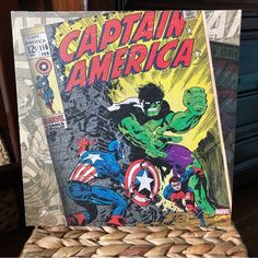 an old comic book sitting on top of a wicker chair in front of a window