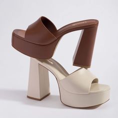 In our bestselling caramel leather, our Dolly Mule is the one that goes year-round. We're obsessed with the way these shoes marry versatility and playful shape that goes to great new heights. Elegante Y Chic, Jennifer Fisher, Elevate Your Look, Leather Mules, Comfortable Sandals, Shoe Store, Winter White, First Lady, Ny Times