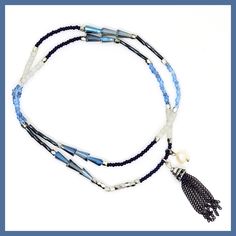 One long strand of colorful beads in shades of blue from navy to sky, plus milky-white round beads and metallic rondels line this stretchy strand that works as a wrap bracelet or a choker! About 18" long, stretches to fit most wrists, no clasp. from Kole Designs Adjustable Beaded Blue Stretch Bracelet, Adjustable Blue Beaded Stretch Bracelet, Blue Multi-strand Hand-strung Bracelet, Blue Hand-strung Multi-strand Bracelet, Adjustable Blue Stretch Bracelet With Colorful Beads, Blue Multi-strand Hand-strung Beaded Bracelets, Flexible Blue Beaded Bracelets, Bohemian Blue Heishi Beads Stretch Bracelet, Blue Beaded Flexible Stretch Bracelet