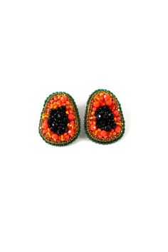 "These vibrant eye-catching earrings are adorned with green colorful beading. Adding a touch of playfulness and elegance to any outfit. Made with high quality material and attention to detail our Avocado Earrings are perfect statement piece to express your unique personality.  These earrings are 100% handmade with so much love to help you add unique pieces to your collection. * Lightweight  * Stud earrings * Push back * Hand beaded  DETAILS Measurements: Length 3\" Width 2\" Weight of each earring 0.12 oz 🫧 HEAD TO OUR WEBSITE FOR MORE 📲 shopandreamboutique.com All artisan earrings are handmade with love and care. Each pair of earrings are unique and one of a kind. Since each piece is handmade, each pair may vary in color and appearance and may not match the picture exactly. PROCESSING T Handmade Multicolor Crystal Earrings For Party, Green Teardrop Beaded Earrings For Party, Multicolor Beaded Crystal Earrings For Party, Unique Green Earrings With Colorful Beads, Party Teardrop Colorful Beaded Earrings, Multicolor Beaded Drop Clip-on Earrings, Unique Colorful Beaded Earrings For Party, Unique Colorful Beaded Party Earrings, Handmade Multicolor Clip-on Earrings For Party