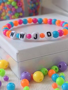 Blue, Orange, Pink WWJD (What Would Jesus Do) trendy bracelet Trendy Blue Beaded Bracelets For Party, Trendy Colorful Party Bracelets, Trendy Multicolor Bracelet For Party, Trendy Personalized Multicolor Bracelets, Trendy Multicolor Bracelets For Parties, Trendy Multicolor Stretch Bracelet For Party, Trendy Multicolor Stretch Bracelet, Party Multicolor Friendship Bracelets With Letter Beads, Personalized Multicolor Beaded Bracelets For Party