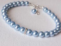 Wedding Light Blue Pearl Silver One Strand Classic Style Dainty Bridal Bracelet. BRACELET is about 7.20 inches (18.3cm) long plus 1 inch extender chain. BRIDAL EARRINGS SECTION: https://www.etsy.com/shop/LanaChayka?ref=seller-platform-mcnav§ion_id=11638940 BRIDAL JEWELRY SETS SECTION: https://www.etsy.com/shop/LanaChayka?ref=seller-platform-mcnav§ion_id=25839214 BRIDAL NECKLACES SECTION: https://www.etsy.com/shop/LanaChayka?ref=seller-platform-mcnav§ion_id=11638944 Elegant and simple, this stunn