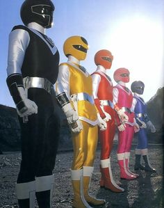 five different colored power rangers standing next to each other