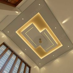 the ceiling in this room is lit up with leds and recessed lighting,