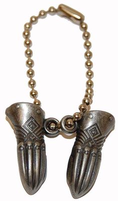 two metal gloves are attached to a ball chain with clasps on each side,