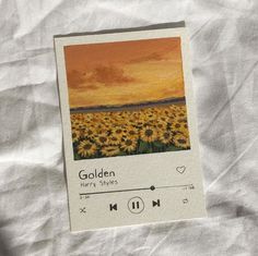 an image of a sunflower field taken on a cell phone with the text golden