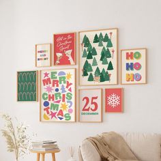 a living room filled with furniture and pictures on the wall