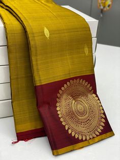 Bridal Collection Mustard Yellow Color Borderless Pure Kanchipuram Silk Saree | Indian Traditional Ethnic Saree | Wedding or Party Wear Saree | Handwoven Gift Saree for Her Product Details : Saree Type : Pure Kanchipuram Silk Saree Golden Zari, Silk Mark Certified Blouse Piece : Yes (Un-Stitched) Saree Length : 5.5 Meters Blouse Piece Length : 80 cm Saree Weight : 0.9 kg Saree Fabric : Pure Kanchipuram Silk  Color : As shown in the picture Work : weaving Pattern : designer Occasion: Party Wear, Mustard Yellow Saree, Saree Golden, Ethnic Saree, Stitched Saree, Yellow Saree, Party Wear Saree, Ethnic Sarees, Yellow Colour, Kanchipuram Silk Saree