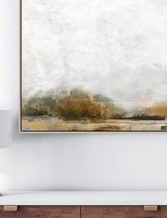 a painting hanging on the wall above a dresser