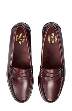 The iconic Weejuns® penny loafer is a true classic, crafted from premium box leather for a luxurious feel. A single single piece of leather is wrapped around a mold, resulting in a supportive and contoured fit that stretches and gets better with wear. Meticulously hand-stitched with a leather sole that can be re-soled for lasting durability, it maintains its elegant silhouette. Perfect for any occasion, this loafer embodies timeless style and comfort. 1/2" platform Leather upper, lining and sole Luxury Casual Loafers With Red Sole, Penny Loafers For Women Outfits, Loafers For Women Outfit, Womens Penny Loafers, Red Loafers, Santa List, Leather Loafers Women, Loafer Women, Loafers Style