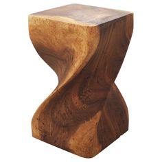 a wooden stool that is made out of wood and has a curved design on the top