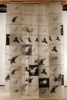 an art installation with black and white images on it