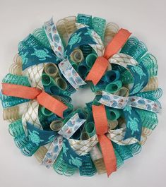 a wreath made out of fabric and ribbon