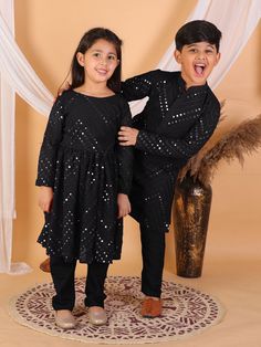 Vastramay Black Mirror Kurta Pyjama Siblings Set Festive Party Wear Kurta With Sequins, Traditional Sequined Sherwani For Party, Sequin Sets For Eid Celebrations, Traditional Black Sets With Sequins, Traditional Black Sequined Sets, Traditional Long Sleeve Sequin Sets, Intricate Mirror, Black Kurta, Kurta Pyjama