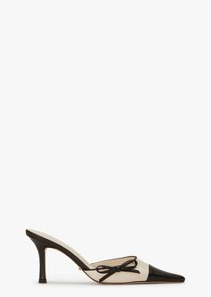 Keep turning heads in our go-to vintage pump,Shirley. Exuding elegance with her sophisticated pointed toe, stiletto heel and dainty bow detailing, this trending style is not one to be missed. Crafted from genuine leather in a classic two tone contrast, you'll be keeping Shirley close by all season. -Material: Genuine Leather -Sole: Rubber -Fit:True to size -Toe-shape: Pointed -Features:Mini Bow Detailing -Heel: 8cm