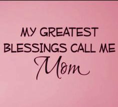 the words on the wall are written in cursive black ink, which reads, my greatest blessing calls me mom