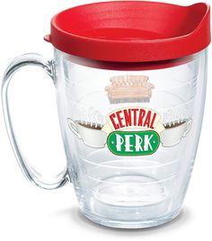 a glass cup with a red lid and handle on the inside is labeled central perk