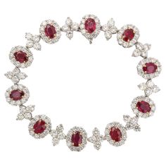 A timeless design. 9.20 carats of Fine Oval Ruby. 14.56 carats of white round brilliant cut diamonds. Set in platinum 7.25 inch length. A beautiful bracelet set with vibrant and bright Ruby. Ruby Bracelet, Ruby Diamond, Round Brilliant Cut Diamond, Brilliant Cut Diamond, Beautiful Bracelet, Round Brilliant, Link Bracelets, Bracelet Set, Diamond Bracelet