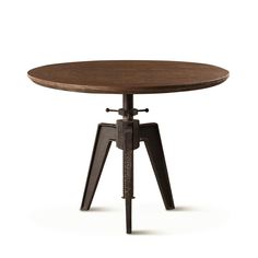 a wooden table with metal legs and an iron base on the top, against a white background