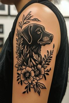 a black and white dog with flowers on it's back half - sleeve tattoo