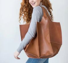 Brand Name: MR.YLLSShape: Casual ToteHandbags Type: Shoulder BagsTypes of bags: Shoulder HandbagsOrigin: CN(Origin)Main Material: PUClosure Type: OPENHardness: SOFTExterior: NONEStyle: CasualLining Material: Synthetic LeatherOccasion: VersatileGender: WOMENPattern Type: SolidNumber of Handles/Straps: SingleInterior: Cell Phone PocketDecoration: NONEItem Type: Handbagsoccasion: shopping,school,travel,work,dailygender: female,females,girls,women,woman,lady,ladieswomen big bag: Large-capacity women Headwear Fashion, Big Handbags, Handbags For School, Large Leather Tote Bag, Oversized Bag, Large Leather Tote, Handbags Casual, Oversize Women, Woman Bags Handbags