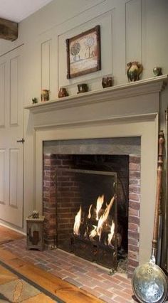 a living room with a fire place in it