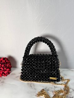 Sleek, chic, and a touch of sparkle - this black beaded bag is your go-to for an effortlessly stylish look.  Dimension: Width: 17.5cm Height: 11cm Depth: 7cm The bag comes with a detachable handle which measures 110cm. Feel free to contact me for any questions. Black Embellished Party Bag, Luxury Black Beaded Evening Bag, Chic Rectangular Sequined Shoulder Bag, Chic Rectangular Sequined Evening Bag, Black Sequin Party Bag, Trendy Embellished Evening Bags, Chic Sequined Shoulder Bag, Black Sequin Evening Bag For Events, Elegant Black Beaded Bags