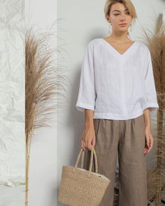 Simply precise and effortlessly elegant linen blouse made from soft linen fabric. Loose, relaxed fit top features deep V neck and dropped shoulders, essential piece in every closet. Linen Summer Outfits, Skirts Pattern, Linen Camisole, Linen Top Women, Linen Shirts Women, Linen Fashion, Linen Style, Linen Blouse, Casual Tops For Women