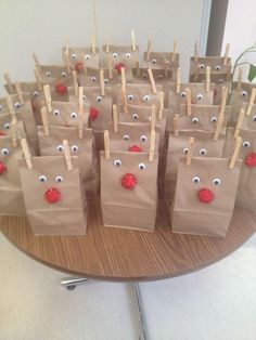 brown paper bags with eyes and noses on them