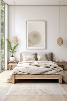 a bedroom with white walls and wooden furniture, including a large bed in the center