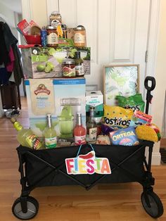 a cart filled with lots of food and condiments