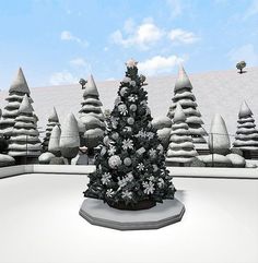 a christmas tree is in the middle of a snowy landscape