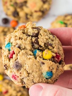 the best monster cookies with m & m cereals on top and text overlay