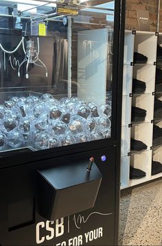 a display case filled with lots of glasses