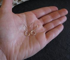 "Our dainty sterling silver minimalist ring earrings are nice and small as well as very lightweight. For days when you just want a touch of shine, throw these on with a pair of jeans. All of our jewelry will arrived boxed and ready to give as a gift. Total length: 1\" Ring diameter: 10mm Available in sterling silver and 14k gold filled Pictured in polished sterling and antiqued sterling Made to order. Allow up to 14 business days for fabrication before shipment. VISIT OUR SHOP: http://www.Poseid Dainty Adjustable Hammered Earrings, Dainty Silver Hoop Earrings In 14k Gold Filled, Dainty Silver Hoop Earrings, 14k Gold Filled, Minimalist Hammered Dangle Jewelry, Dainty Silver 14k Gold-filled Hoop Earrings, Simple Hammered Sterling Silver Jewelry, Dainty Silver 14k Gold Filled Hoop Earrings, Dainty Small Hoop Hammered Earrings, Dainty Hammered Sterling Silver Earrings