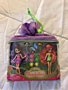 the tinker bag has two dolls in it