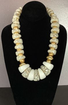 "This is a statement piece of vintage 1960s jewelry, definitely a show stopper. It is made from chunky rings of solid white and clear lucite with white flecks. There are gold balls and fancier beads used for spacers.  This vintage 1960s lucite necklace is strung on a small chain.   When laid out flat the necklace is 23\" long. The widest lucite ring is 1.25\" across.  Free Shipping in the Continental USA." 1960s Jewelry, Fancy Beads, Chunky Rings, Wedding Jewellery Necklace, Vintage 1960s, Wedding Necklace, Necklace Etsy, Wedding Jewelry, Vintage Jewelry