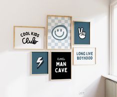 there are many framed pictures hanging on the wall in this room, and one is saying cool kids club while the other says little man cave