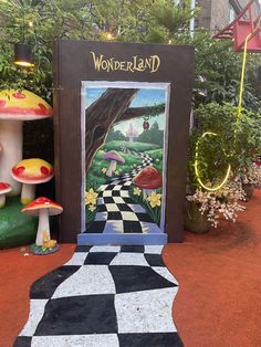 the entrance to wonderlandland is decorated with colorful mushrooms and toad figurines on display