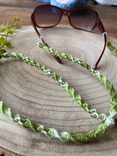 "Green glasses chain, sunglasses glasses strap, glasses holder, sight glasses chain women, glasses lanyard, eyeglass holder necklace Twisted sunglasses/glasses hanging cord, made with eco friendly, lime green recycled cotton yarn called \"tropical flush\" and finished with clear loops on each end, to easily slip onto any glasses. One size of approximately 70-75cm total length, however, can be made to your required length if preferred. please message me if you need something other than the standa Trendy Green Glasses Chains For Beach, Summer Everyday Glass Glasses Chains, Adjustable Glass Sunglasses As Gift, Handmade Sunglasses For Summer Gift, Trendy Adjustable Glasses Chains For Everyday Use, Trendy Handmade Sunglasses As A Gift, Trendy Handmade Sunglasses As Gift, Trendy Handmade Sunglasses Perfect As A Gift, Trendy Handmade Sunglasses For Gift