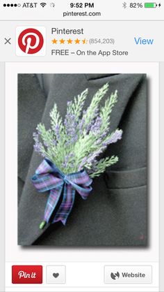 a boutonniere with lavender and green leaves tied to the lapel of a suit