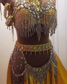 a woman wearing a belly dance costume